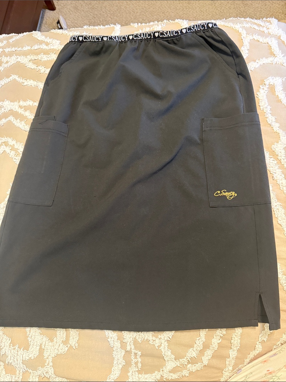 C. Saucy black scrub skirt
